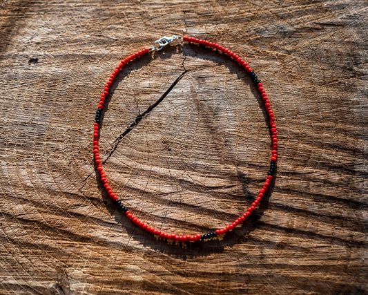 Red and black choker necklace