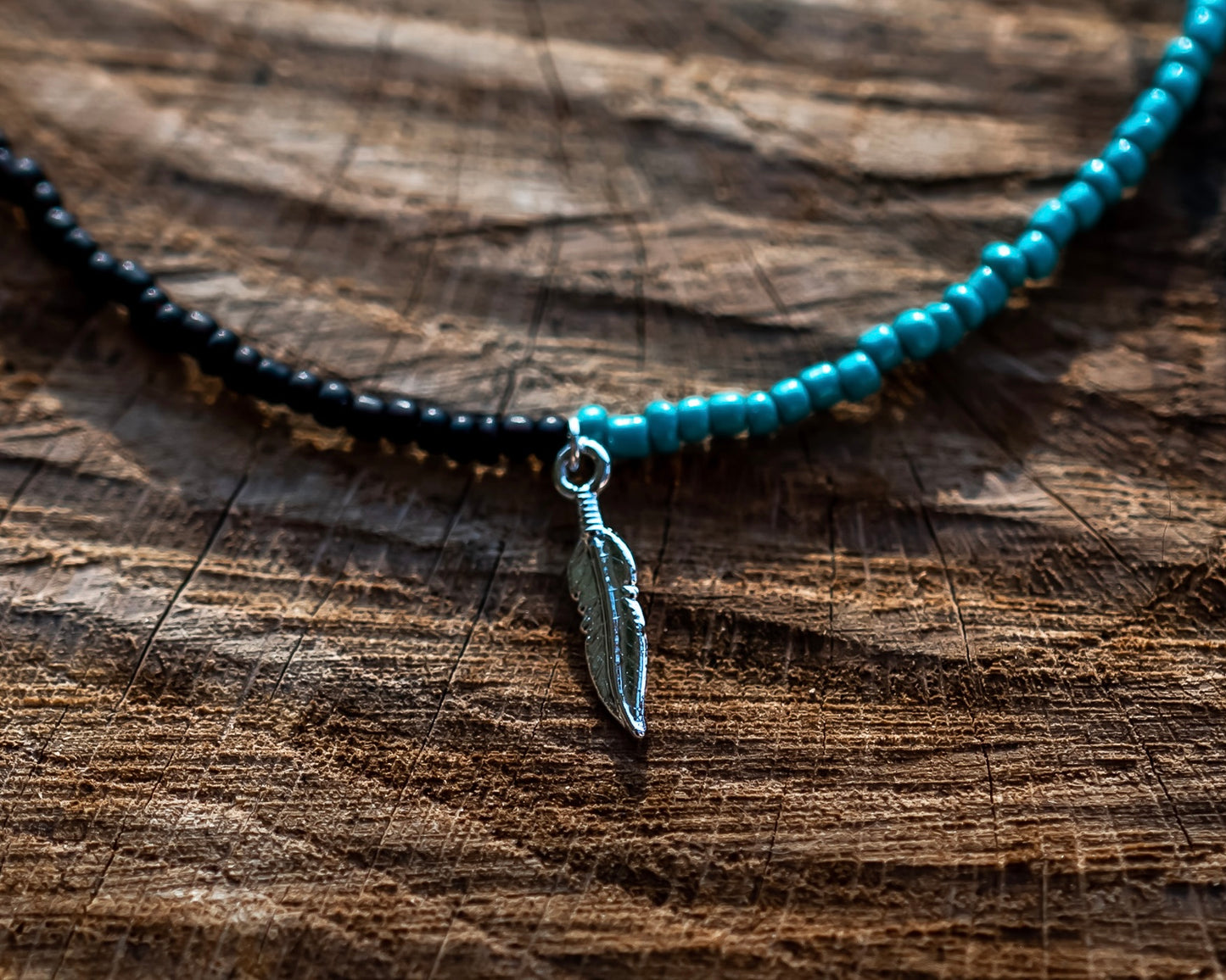 Half color choker necklace with feather charm
